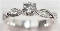21X- 14k elegant diamond twist ring -$3,600