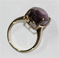 18ct yellow gold amethyst set dress ring on a