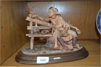 Giuseppe Armani figurine of a tramp seated on an