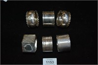 Collection of 6 assorted sterling serviette rings,