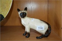 Royal Doulton figurine of a Siamese cat, standing