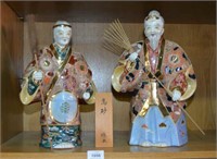 Pair of Japanese satsuma figures of a man