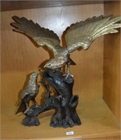 Large cast iron statue of 2 eagles on a tree
