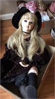 Porcelain doll: girl and black dress