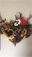 Metal wall sconce w/ artificial flowers