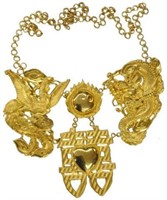 24K GRIFFON AND DRAGON NECKLACE ON A 22K CHAIN.