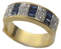 18K SAPPHIRE AND DIAMOND BAND RING.