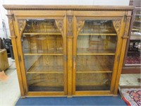 OUTSTANDING ANTIQUE CARVED AMERICAN OAK BOOKCASE