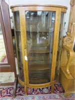 NCE ANTIQUE AMERICAN OAK CURVED GLASS CURIO