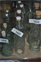 4 cost plus glass bottles with metal latch lids