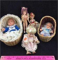 1 Porcelain Doll and 4 Plastic Dolls