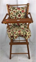 Dial high chair with cushion seat and back