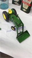 John Deere toy tractor and loader bucket