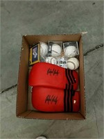 Box of baseball's, signed gloves