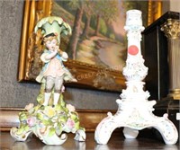 2 PORCELAIN CANDLESTICKS, 1 WITH BOY PLAYING