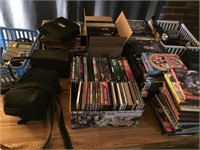 Assorted Tapes, CD's, and VHS