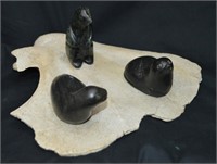 Inuit Soapstone Carvings On Whale Bone Base