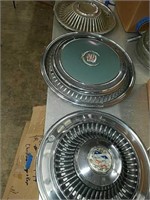 Three vintage classic car Hubcaps from Pontiac,