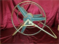 Vintage metal hose reel, the reel measures about