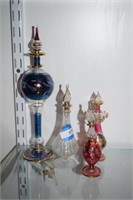 Four Glass Perfume Decanters and Two