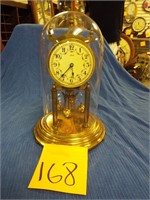 Kundo gold trim anniversary clock wit