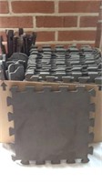 Large group of foam floor puzzle pads and drawer