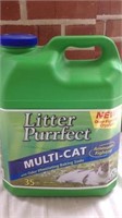 Multi cat litter half full of 35 lb container