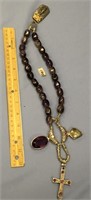 Purple jade bead necklace with 2 pendants attached