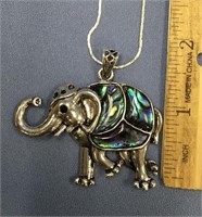 Silver alloy and abalone elephant pendant on a ste