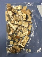 Choice on 2 (12-13) bags of scrap ivory pieces