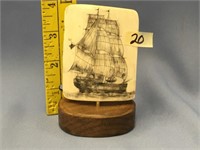 4" tall ivory platchet scrimmed with a sailing ves