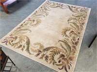 ABOUT 5X8 AREA RUG