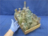 32 antique bottles - mostly embossed