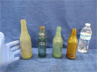 4 antique bottles