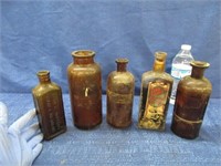 5 antique bottles (amber)