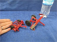 2 old small red metal toy farm implements