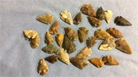 Set of 28 carved stone arrowheads , all about 1