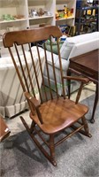 Maple rocking chair with arms, the right arm