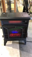 Electric fireplace heater, works fine has a nice
