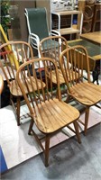 Four Oak Loop back dining chairs made by