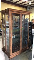 Seven shelf glass display cabinet with two doors