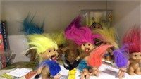 Group of 15 different troll dolls, in different