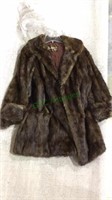 Real fur coat by Jandel, 3/4 length with cuff