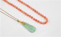 A coral necklace and a jadeite & gold necklace