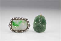 Two carved jadeite plaque pendants