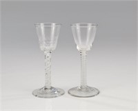 Two Georgian air twist wine glasses