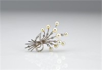 Gold, pearl, and diamond floral spray brooch