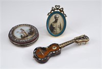 Three decorative antique accessories