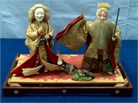 Oriental Couple on Wooden Stand