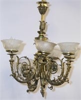 Neo-classical Victorian six arm brass chandelier.